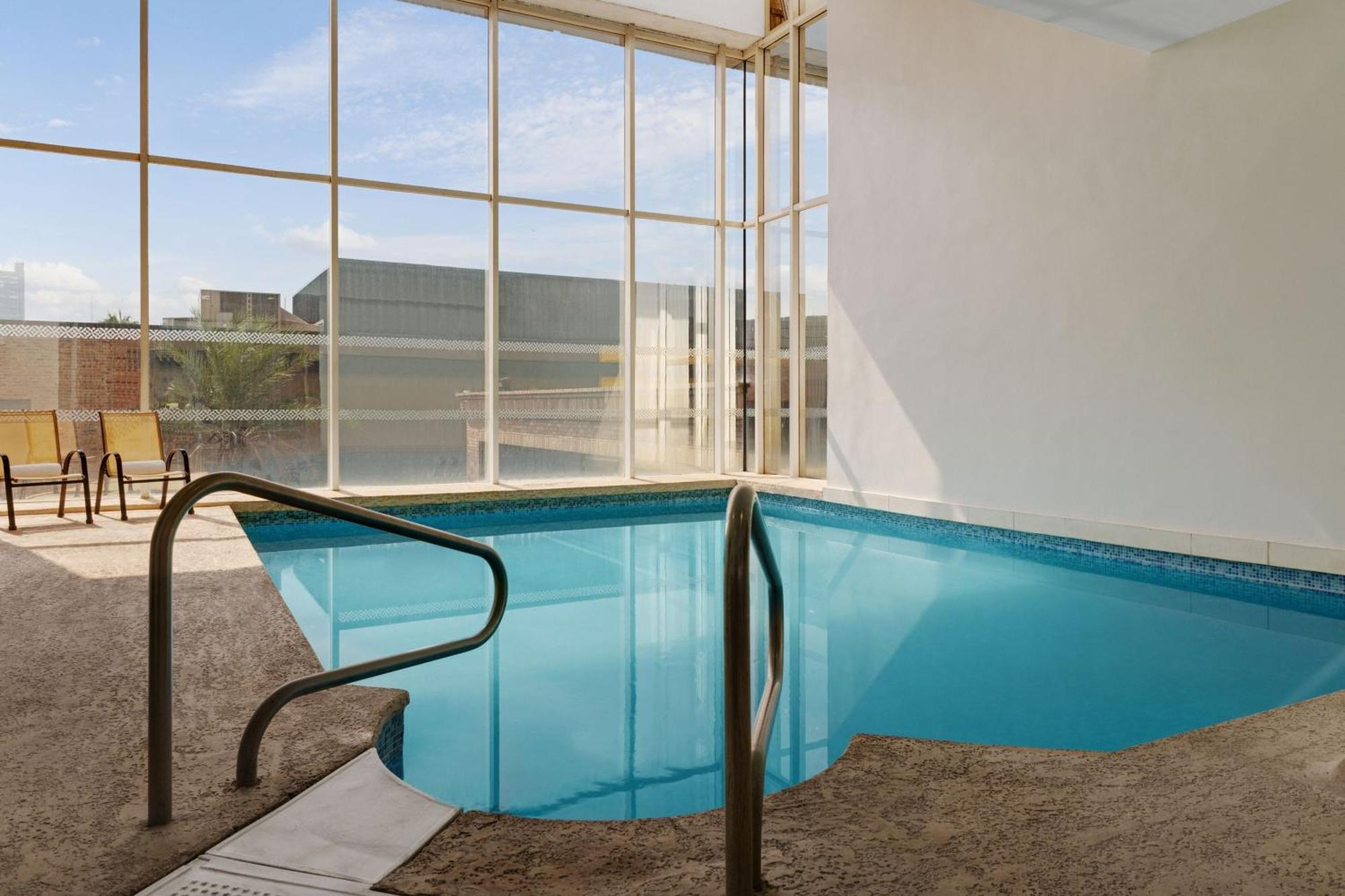 Four Points By Sheraton Galerias Монтеррей Экстерьер фото The pool at the 1964 Olympic Village
